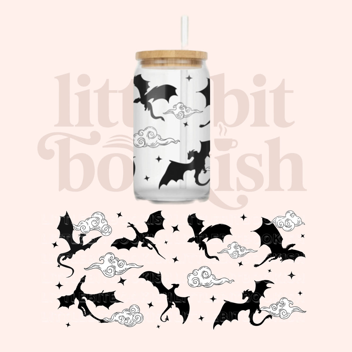 A clear glass can-style tumbler with a bamboo lid and white straw, printed with black flying dragons and white clouds on a pale pink background. A matching sheet of the same dragons-and-cloud designs appears below, and a faint 'little bit bookish' watermark is visible across the image.