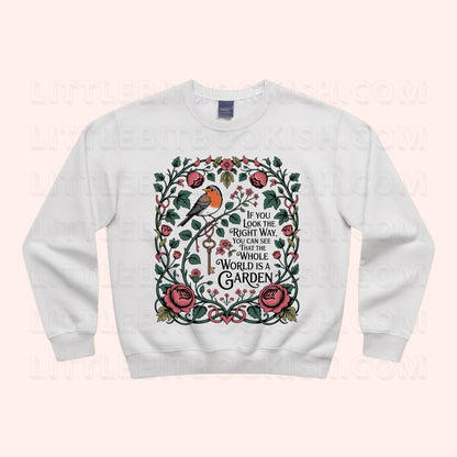 The Whole World is a Garden unisex sweatshirt with botanical quote illustration featuring florals and a Red Robin, inspired by The Secret Garden by Frances Hodgson Burnett